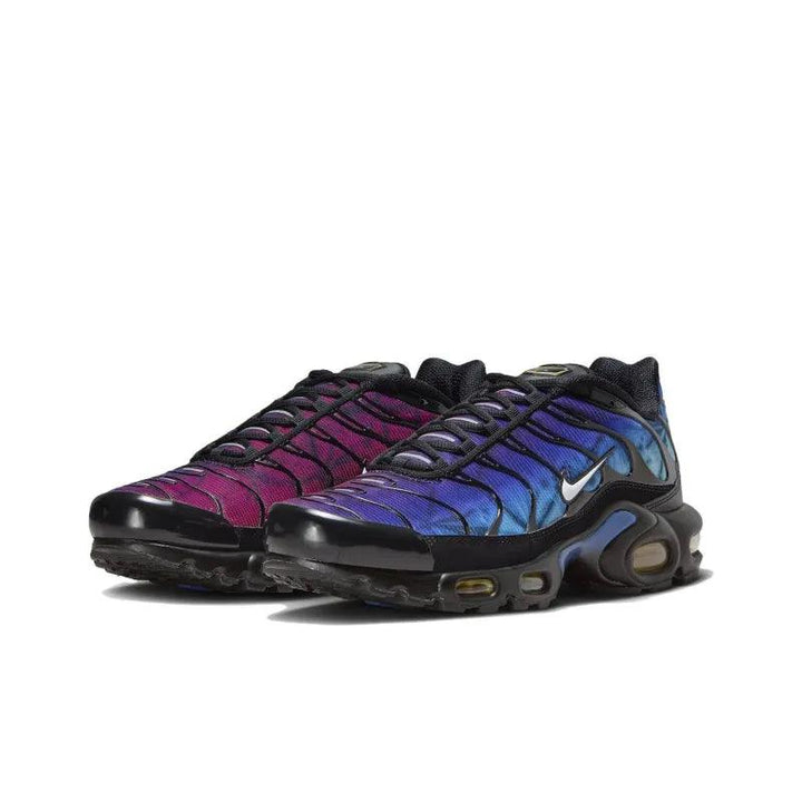 Nike Air Max Plus sneakers in a purple and blue gradient colorway.