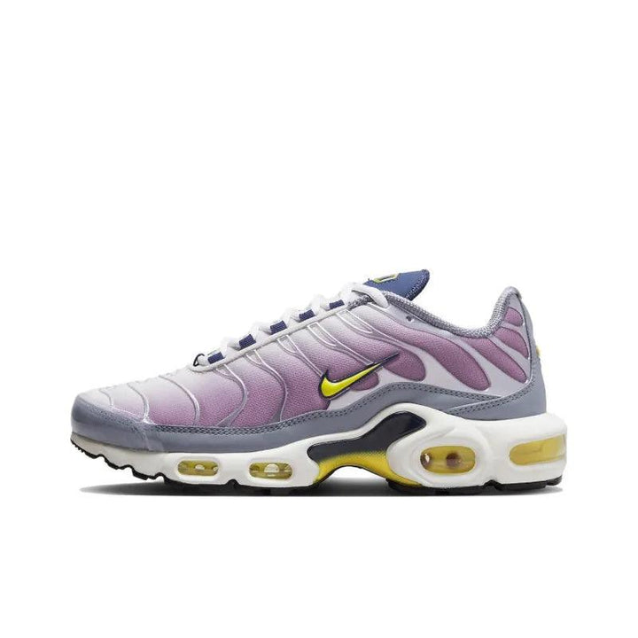 Purple and lavender Nike Air Max Plus sneakers with yellow accents and white soles.
